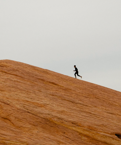 running up a hill